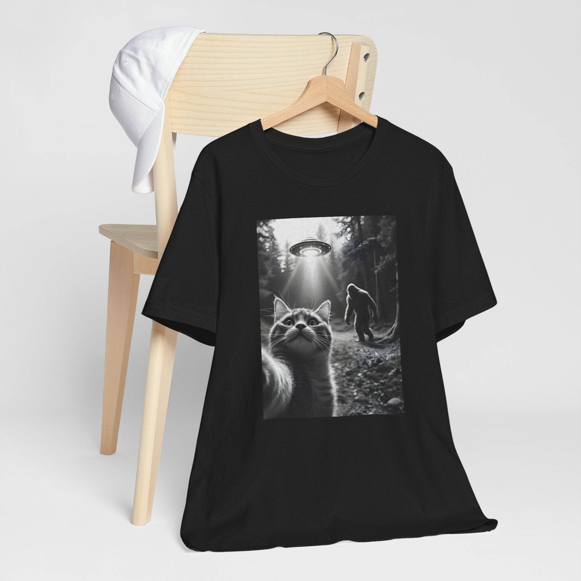 T-Shirt - Cat Taking a Selfie with Bigfoot and UFO Design - QHC Supply